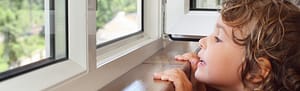 Unbreakable Glass Workload and Service Availability Image - Child Near the Window